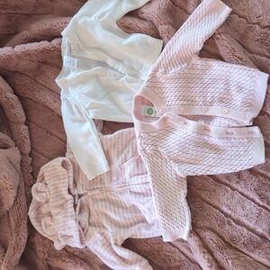 Bundle of pink sweaters